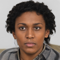 Neutral black young-adult female with short  brown hair and brown eyes