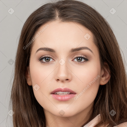 Neutral white young-adult female with long  brown hair and brown eyes