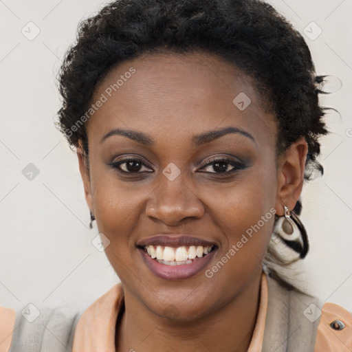 Joyful black young-adult female with long  brown hair and brown eyes