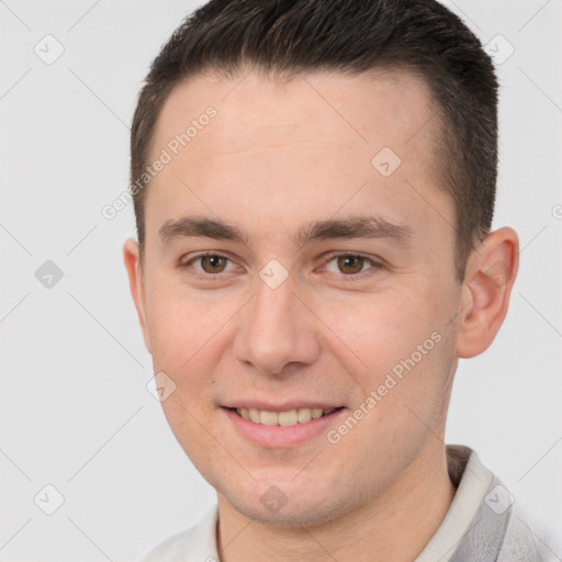 Joyful white young-adult male with short  brown hair and brown eyes