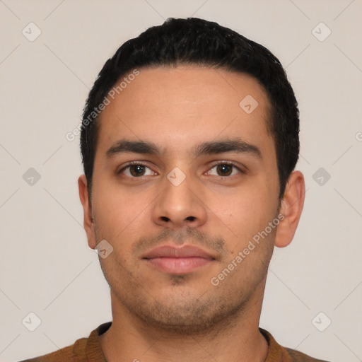 Neutral latino young-adult male with short  black hair and brown eyes