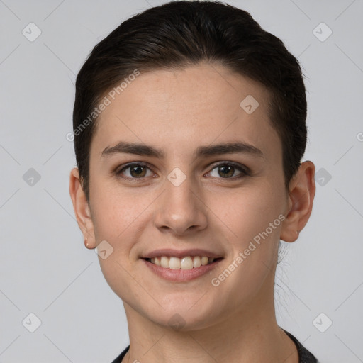 Joyful white young-adult female with short  brown hair and brown eyes