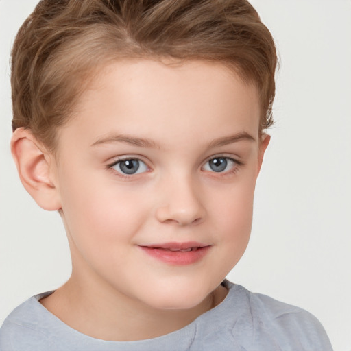 Joyful white child female with short  brown hair and brown eyes