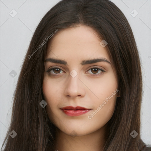 Neutral white young-adult female with long  brown hair and brown eyes