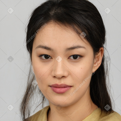 Joyful asian young-adult female with medium  brown hair and brown eyes