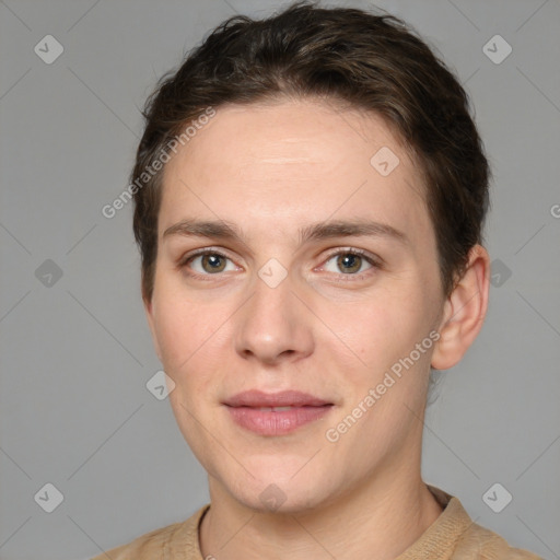 Joyful white young-adult female with short  brown hair and grey eyes