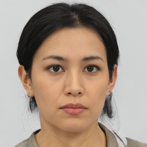 Neutral asian young-adult female with medium  black hair and brown eyes