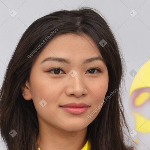 Joyful asian young-adult female with long  brown hair and brown eyes