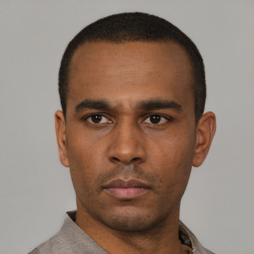 Neutral black young-adult male with short  black hair and brown eyes