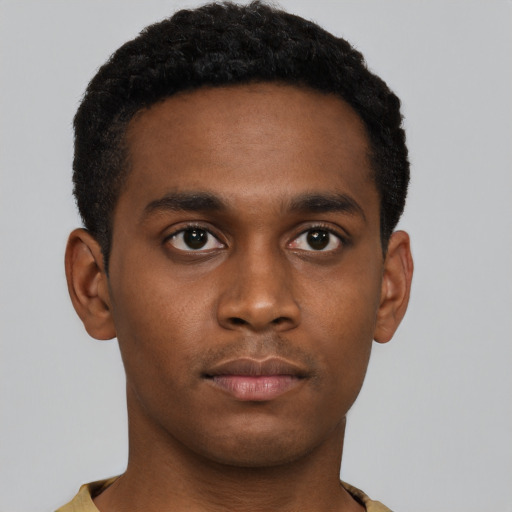 Neutral black young-adult male with short  brown hair and brown eyes