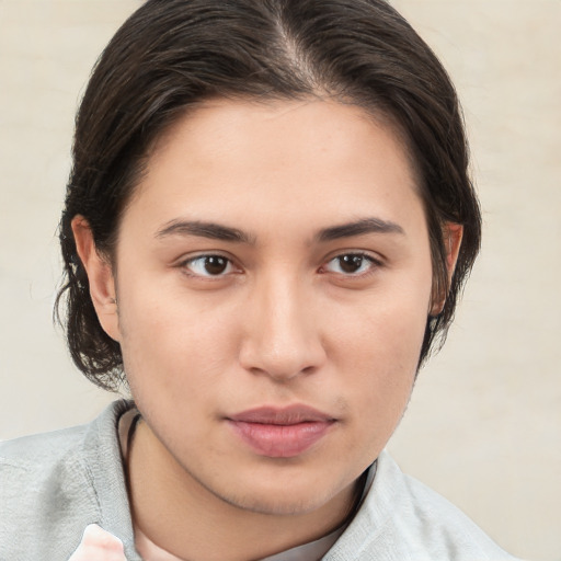 Neutral white young-adult female with medium  brown hair and brown eyes