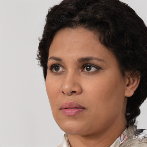 Neutral white young-adult female with short  brown hair and brown eyes