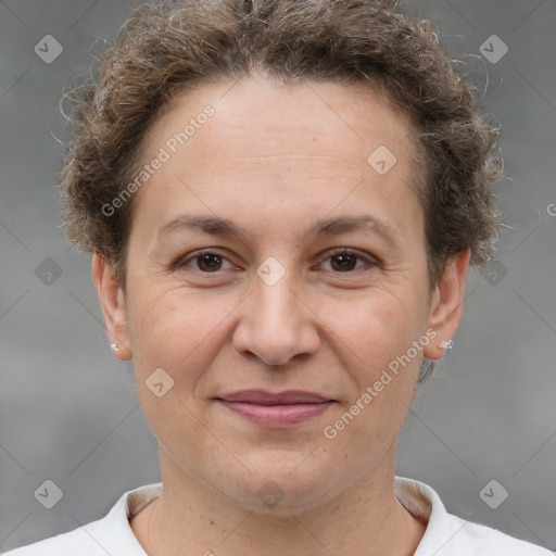 Joyful white adult female with short  brown hair and brown eyes