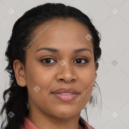 Joyful black young-adult female with long  brown hair and brown eyes