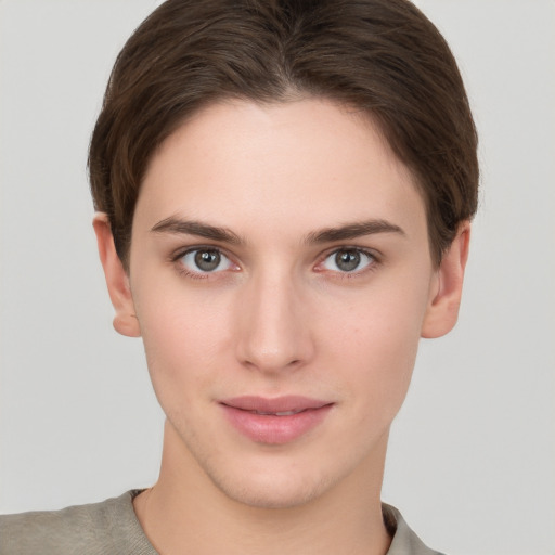 Neutral white young-adult female with short  brown hair and brown eyes