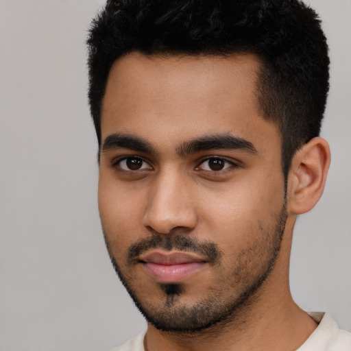 Neutral latino young-adult male with short  black hair and brown eyes