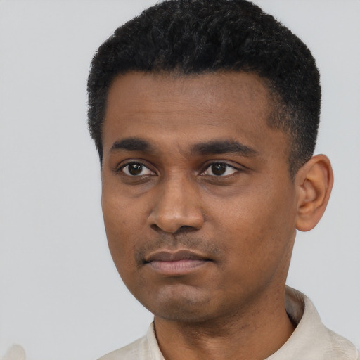 Neutral black young-adult male with short  black hair and brown eyes