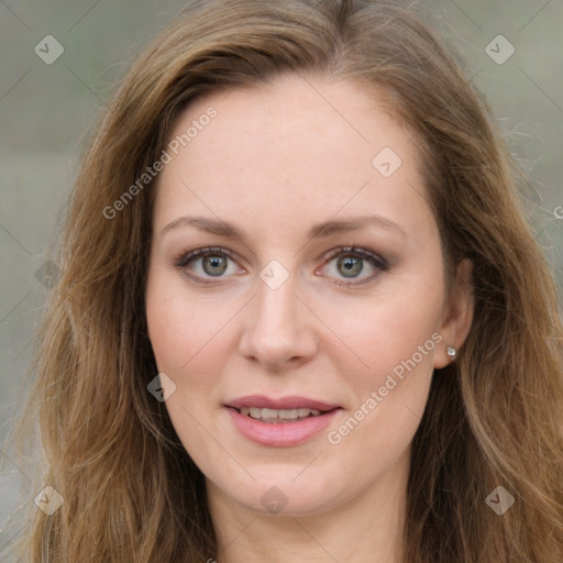 Joyful white young-adult female with long  brown hair and green eyes