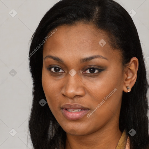 Joyful black young-adult female with long  brown hair and brown eyes