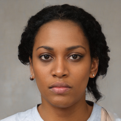 Neutral latino young-adult female with short  black hair and brown eyes