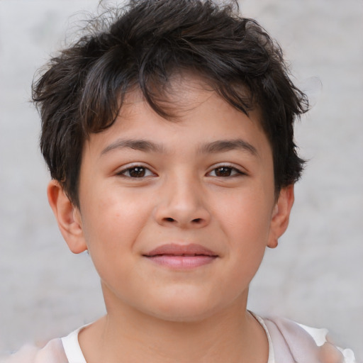 Joyful white child male with short  brown hair and brown eyes