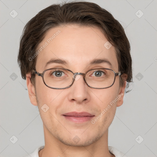 Joyful white adult male with short  brown hair and grey eyes