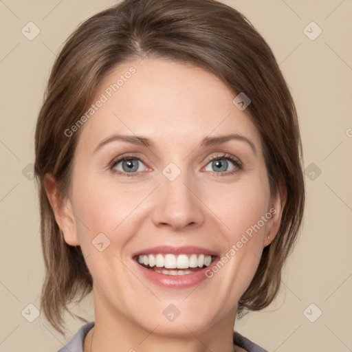 Joyful white young-adult female with medium  brown hair and blue eyes