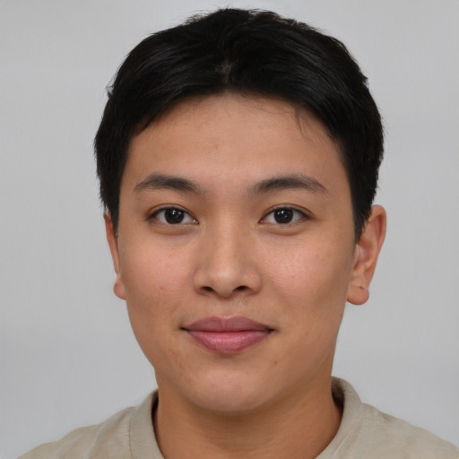 Joyful asian young-adult female with short  brown hair and brown eyes