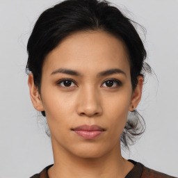 Neutral asian young-adult female with medium  black hair and brown eyes