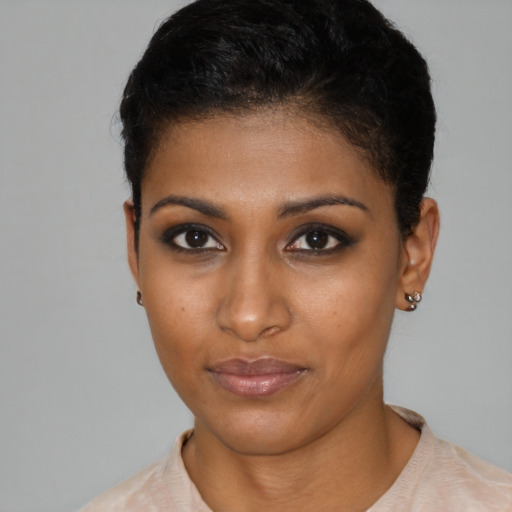 Neutral black young-adult female with short  brown hair and brown eyes