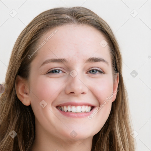 Joyful white young-adult female with long  brown hair and blue eyes