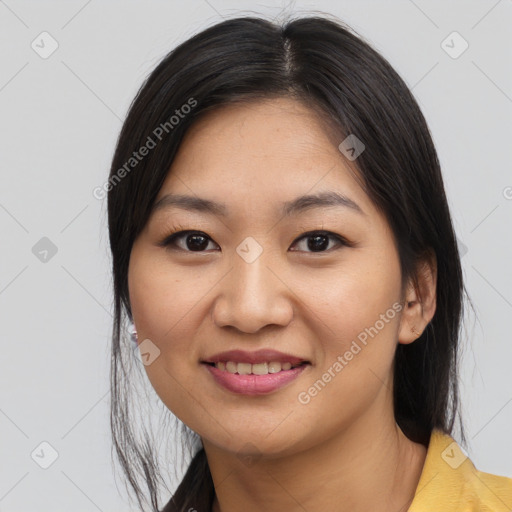 Joyful asian young-adult female with medium  black hair and brown eyes