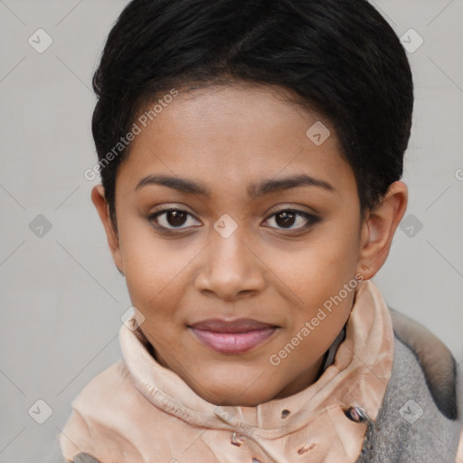 Joyful black young-adult female with short  black hair and brown eyes