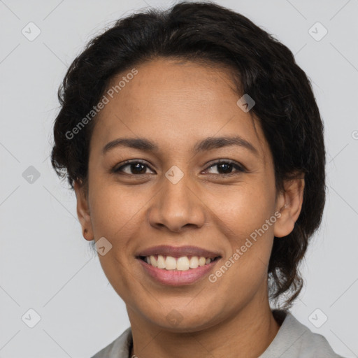 Joyful latino young-adult female with short  brown hair and brown eyes