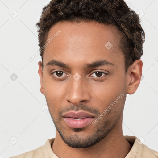 Neutral black young-adult male with short  brown hair and brown eyes