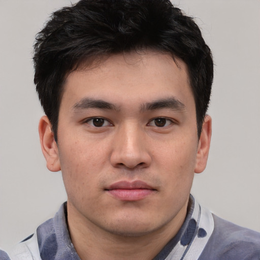 Neutral asian young-adult male with short  brown hair and brown eyes