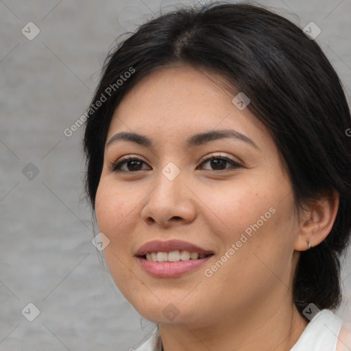 Joyful asian young-adult female with medium  brown hair and brown eyes