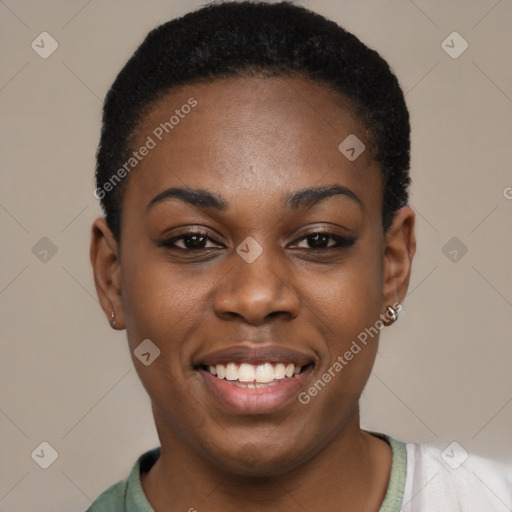 Joyful black young-adult female with short  black hair and brown eyes