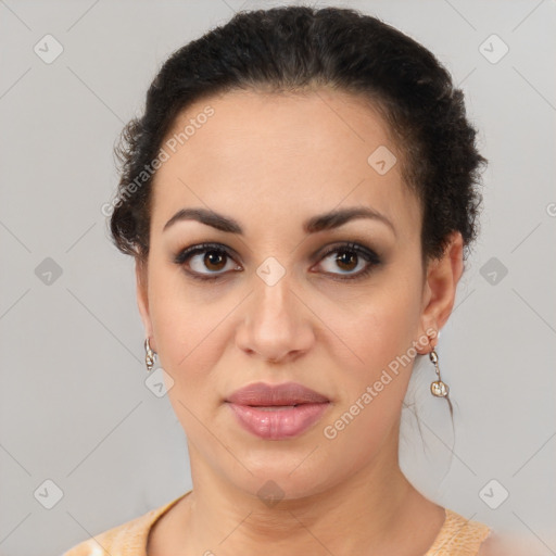 Joyful latino young-adult female with short  brown hair and brown eyes