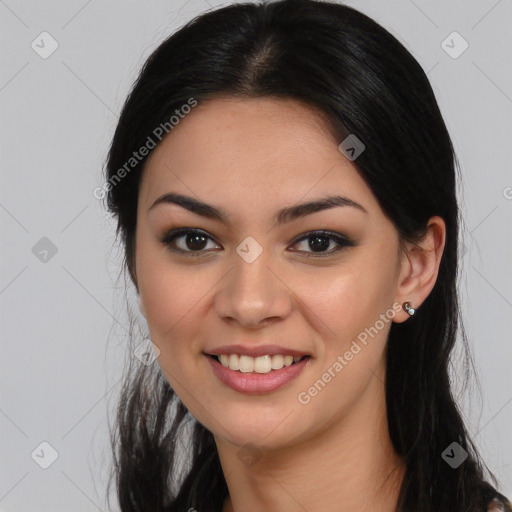 Joyful asian young-adult female with long  brown hair and brown eyes