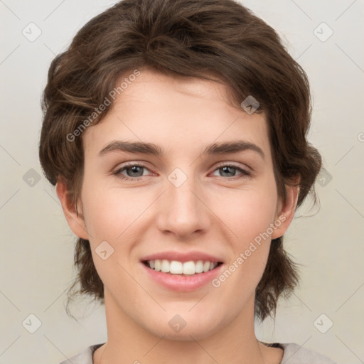 Joyful white young-adult female with medium  brown hair and green eyes