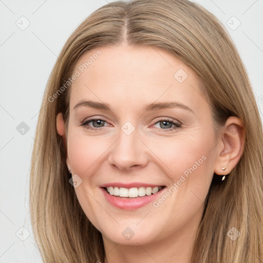 Joyful white young-adult female with long  brown hair and grey eyes