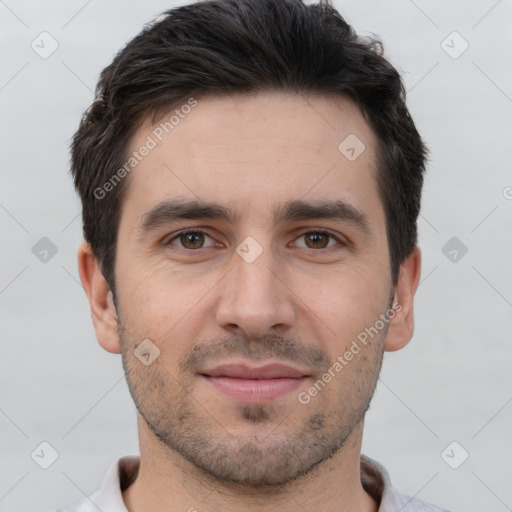 Joyful white young-adult male with short  brown hair and brown eyes