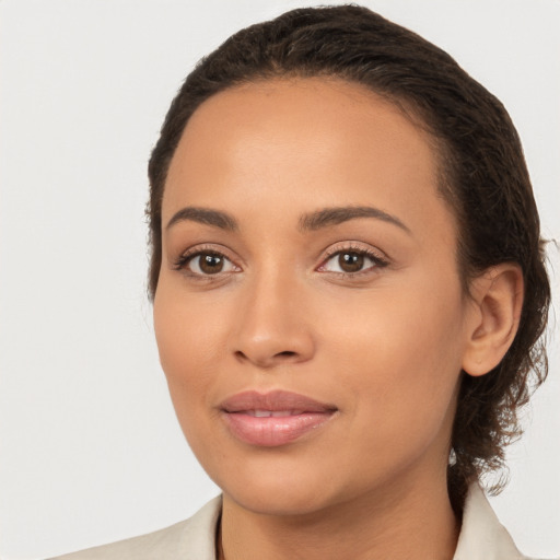 Joyful white young-adult female with medium  brown hair and brown eyes