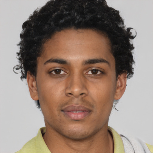 Neutral black young-adult male with short  brown hair and brown eyes