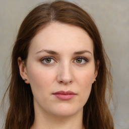 Neutral white young-adult female with long  brown hair and green eyes