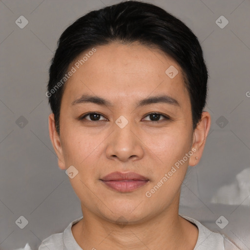 Joyful asian young-adult female with short  black hair and brown eyes