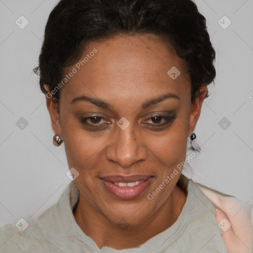 Joyful black adult female with short  brown hair and brown eyes