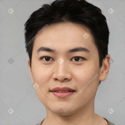 Joyful white young-adult male with short  black hair and brown eyes