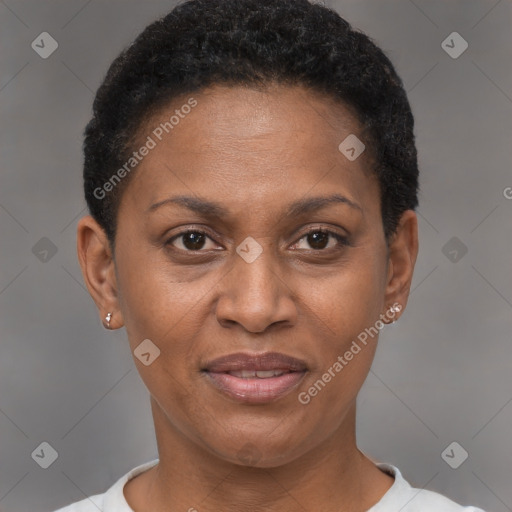 Joyful black adult female with short  brown hair and brown eyes